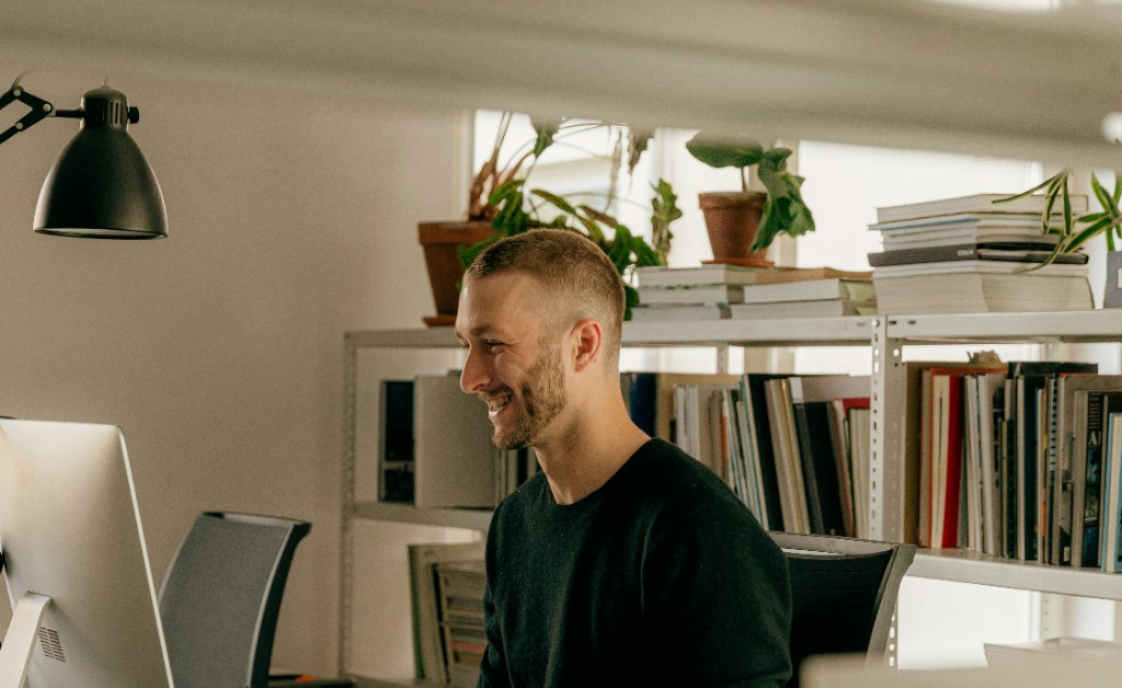 Team collaborating in a warm, customer-facing environment